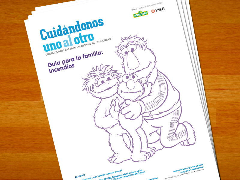 Guia para la familia: Incendios. Elmo abrazando a sus padres.