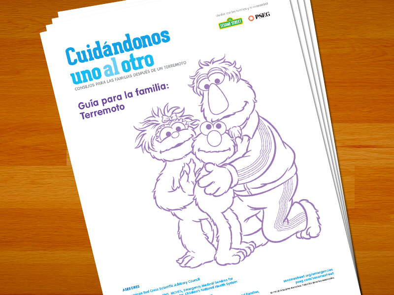 Guia para la familia: Terremotto. Elmo abrazando a sus padres.