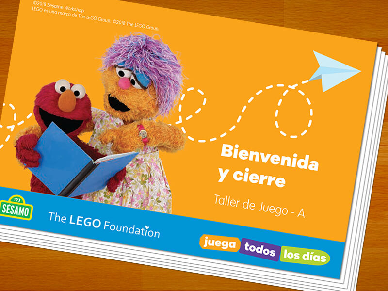 Elmo y su mama leyendo 