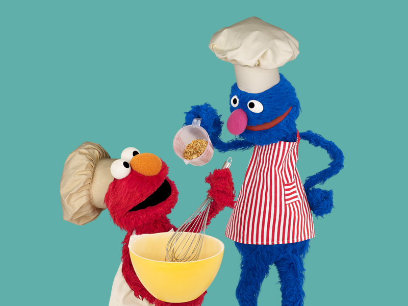 Elmo y Archibaldo cocinando 